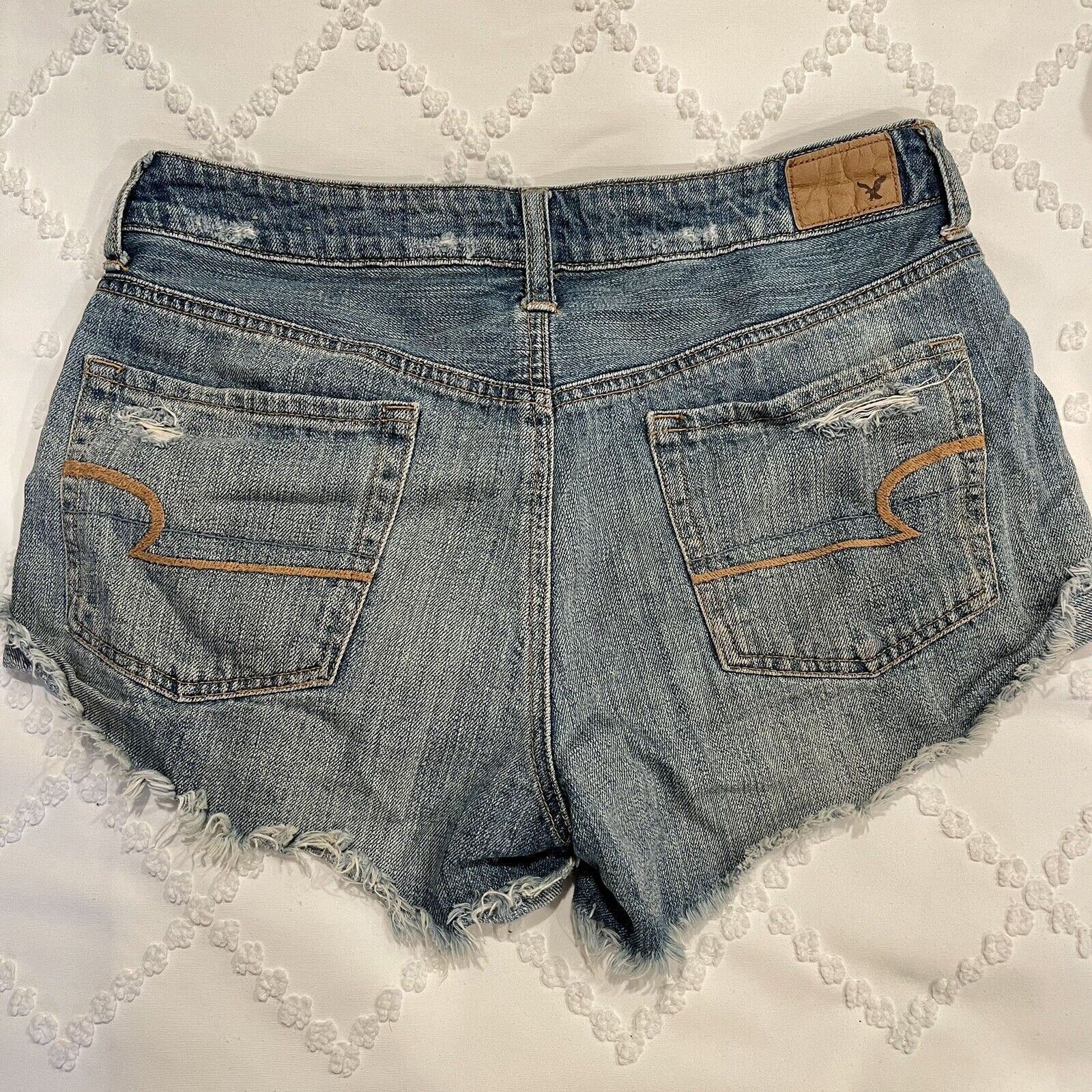 American Eagle Embroidered Floral Patch Distressed Low Rise Denim Shorts - 8